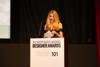 Amy Guitierrez of Bernina announcing Winner of Best Handmade Handbag 