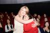 IHDA Winners on stage From Belo Charlotte Bingham Wallis and Maria Costa emotionally watching their video
